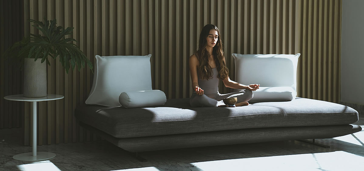 Om Sound Healing: AUM (OM) Chanting at 396 Hz, woman meditating on sofa